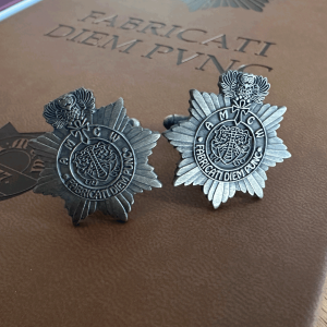 City Watch Cufflinks sitting not top of the City Watch notebook