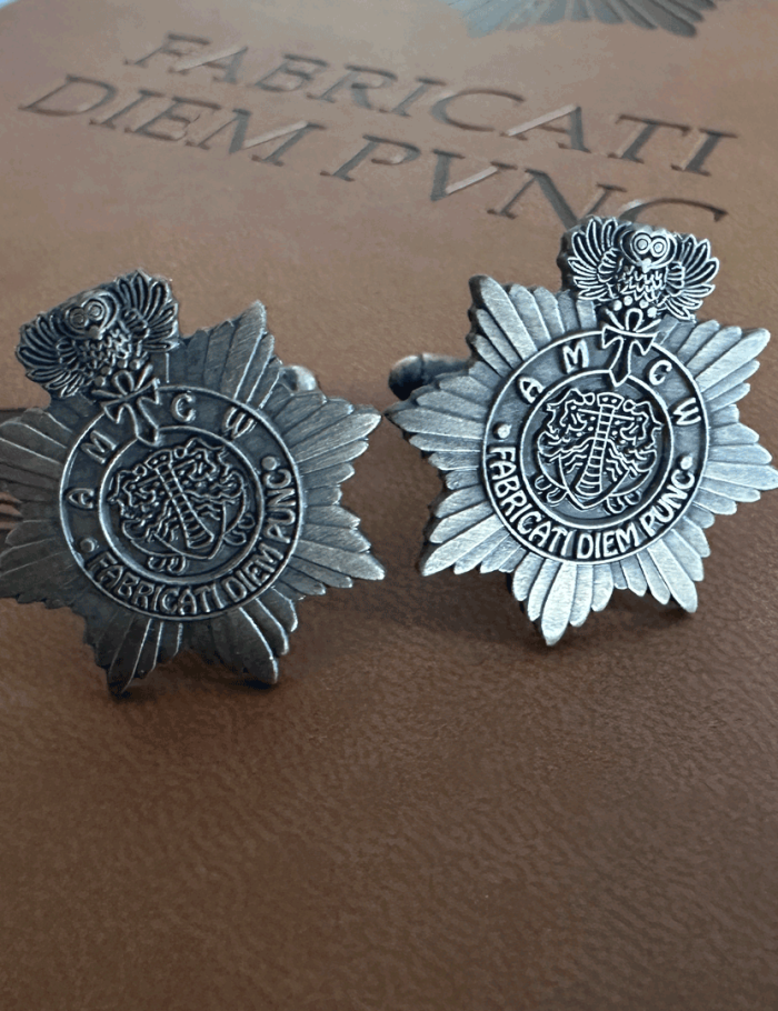 City Watch Cufflinks sitting not top of the City Watch notebook