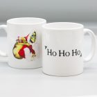 Bright white ceramic mug featuring Death as the Hogfather by Paul Kidby, "HO HO HO"