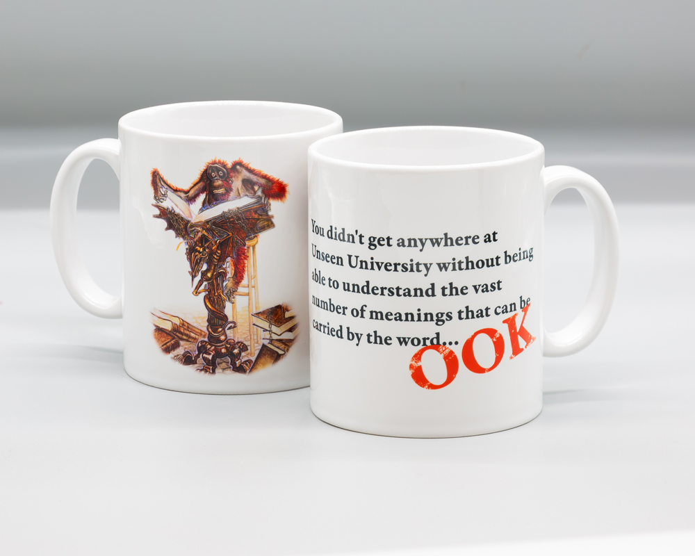 Librarian OOK mug Bright white ceramic mug featuring the Librarian at the lecturn by Paul Kidby, Discworld Unseen University character with a quote and the slogan "OOK"