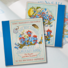 Birds Eye view of a Discworld Emporium original hardback. Featuring the Feegles teaching the alphabet.