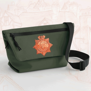 Forest green mini messenger bag with copper Ankh-Morpork City Watch badge and black adjustable strap.